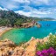 Waar en wanneer kunt u zwemmen op Sardinië: zeetemperatuur van maand tot maand